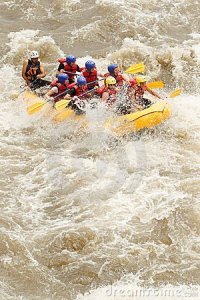 A group of people white water rafting down the New River in West Virginia 